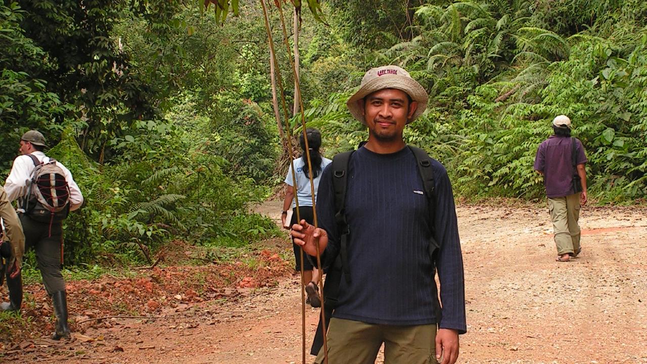 Picture of student holding a frond of Pteris holttumii