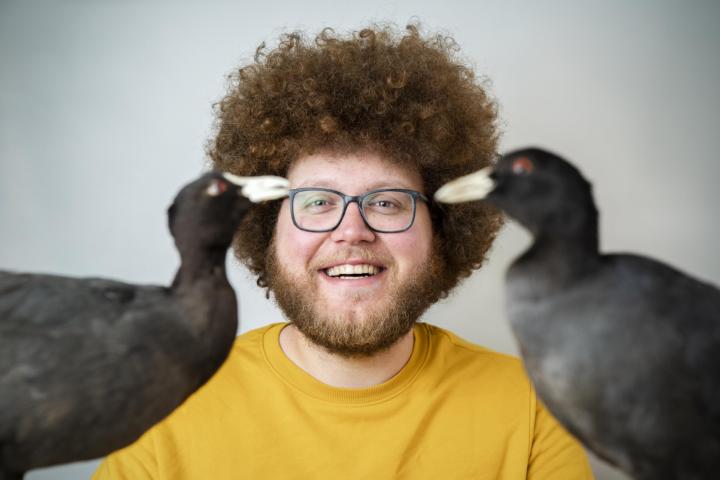 Auke-Florian Hiemstra met meerkoeten