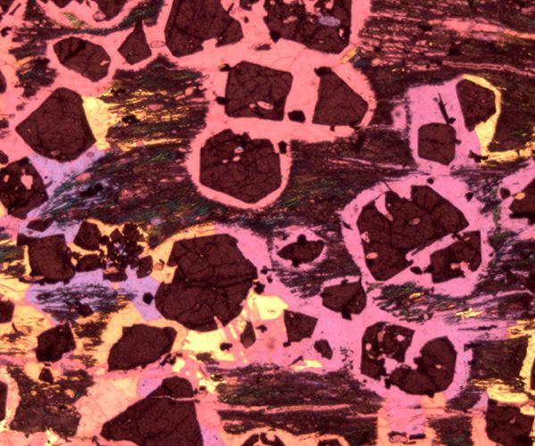 spinel crystals in melted xenolith, Cerro del Hoyazo, Spain